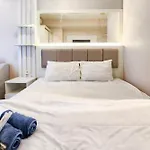 Redliving Apartemen Grand Kamala Lagoon-Asl Room